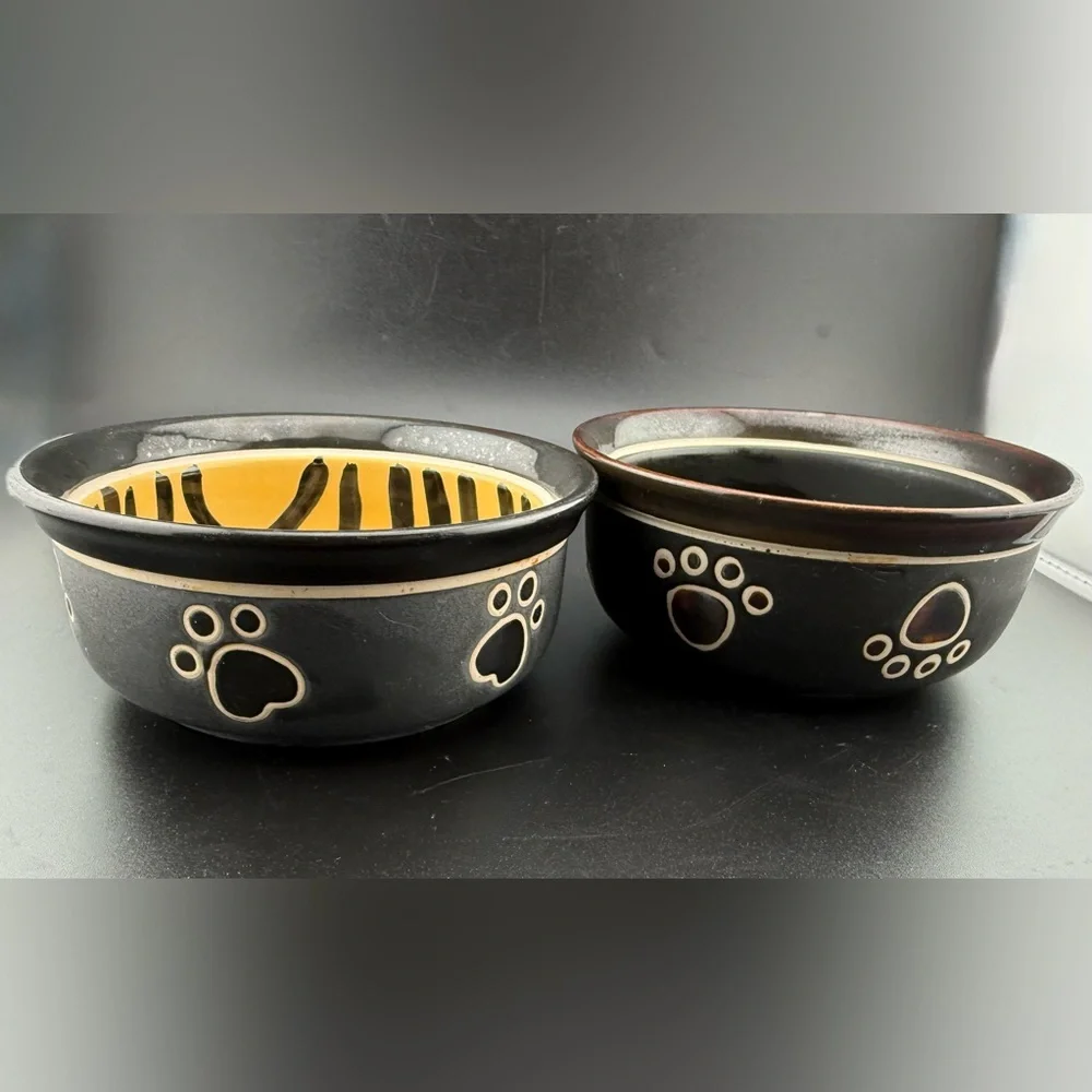 2 small dog dishes. Chic tiger print and bone print. 5”
